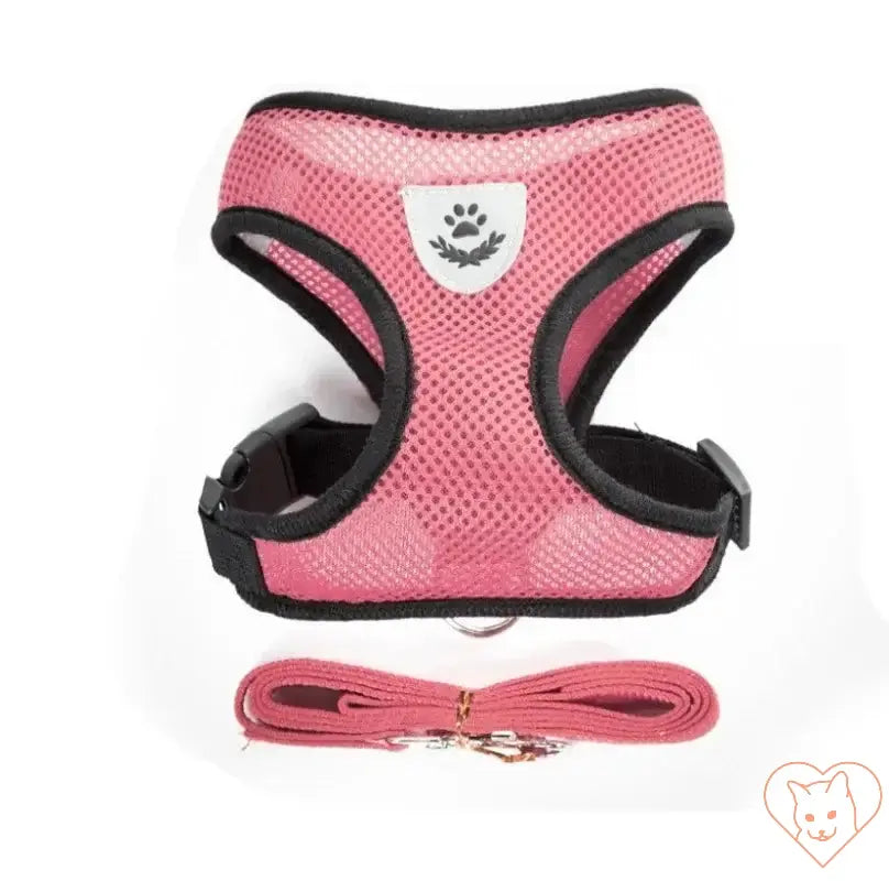 Adjustable reflective cat harness in pink with leash, made from breathable polyester for comfort and safety.
