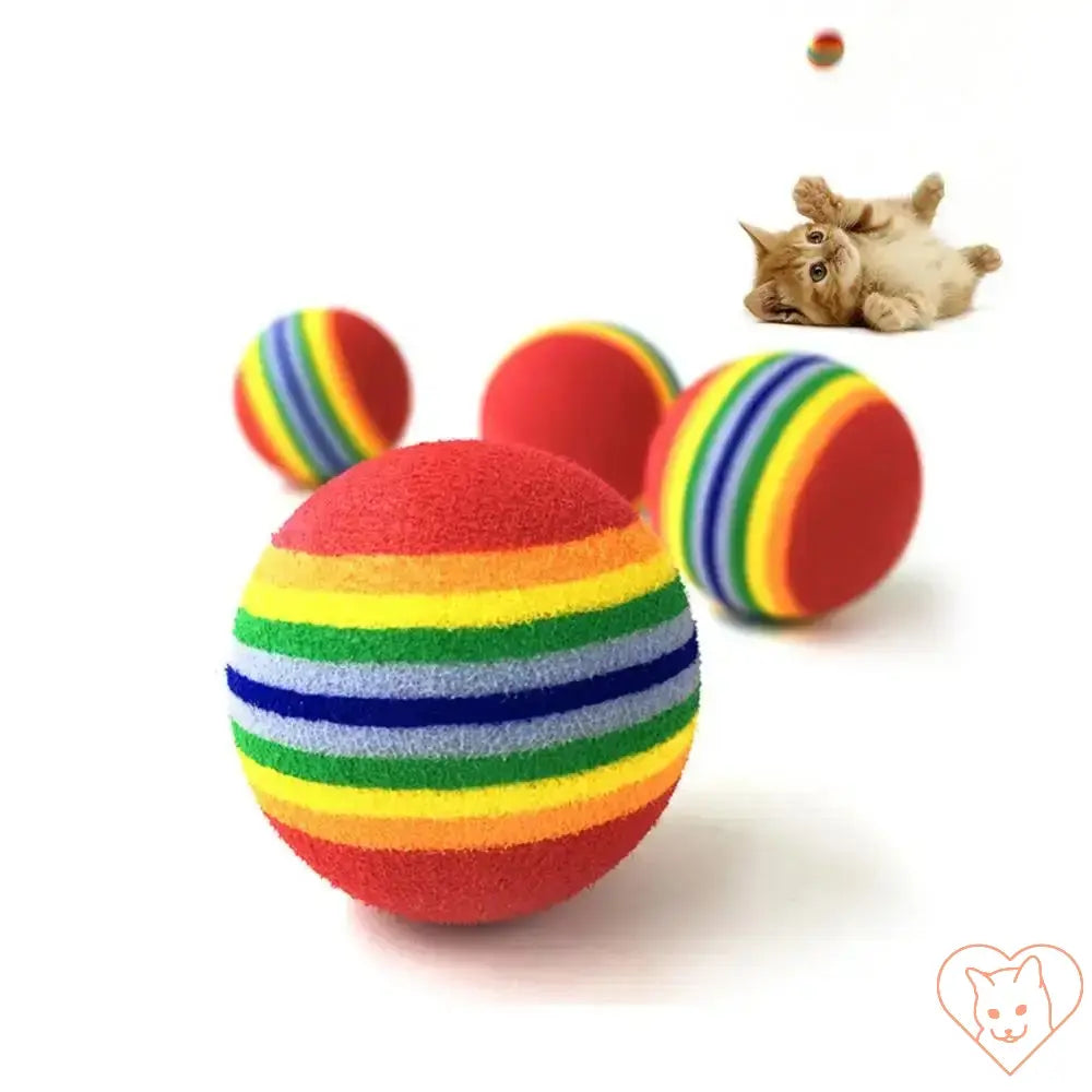 Colorful rainbow cat fetch balls in vibrant designs with a playful cat in the background, ideal for indoor play and teething relief.