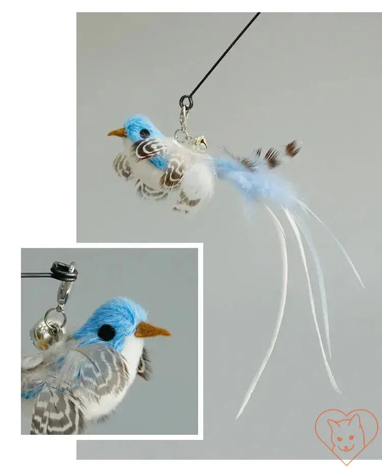 Colorful feather bird attachment for cat wand toy, featuring blue and white feathers with a playful design.