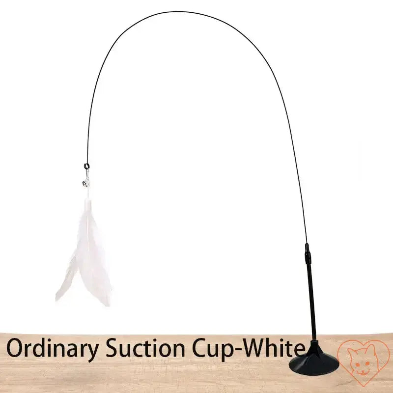Interactive feather cat wand with suction cup for cat play and exercise.