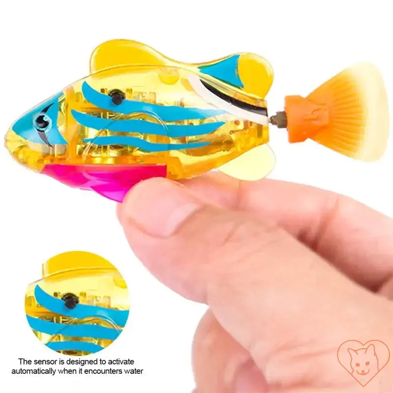 Interactive LED Robo Fish Cat Toy being held in hand, designed to swim and attract cats with vibrant colors.