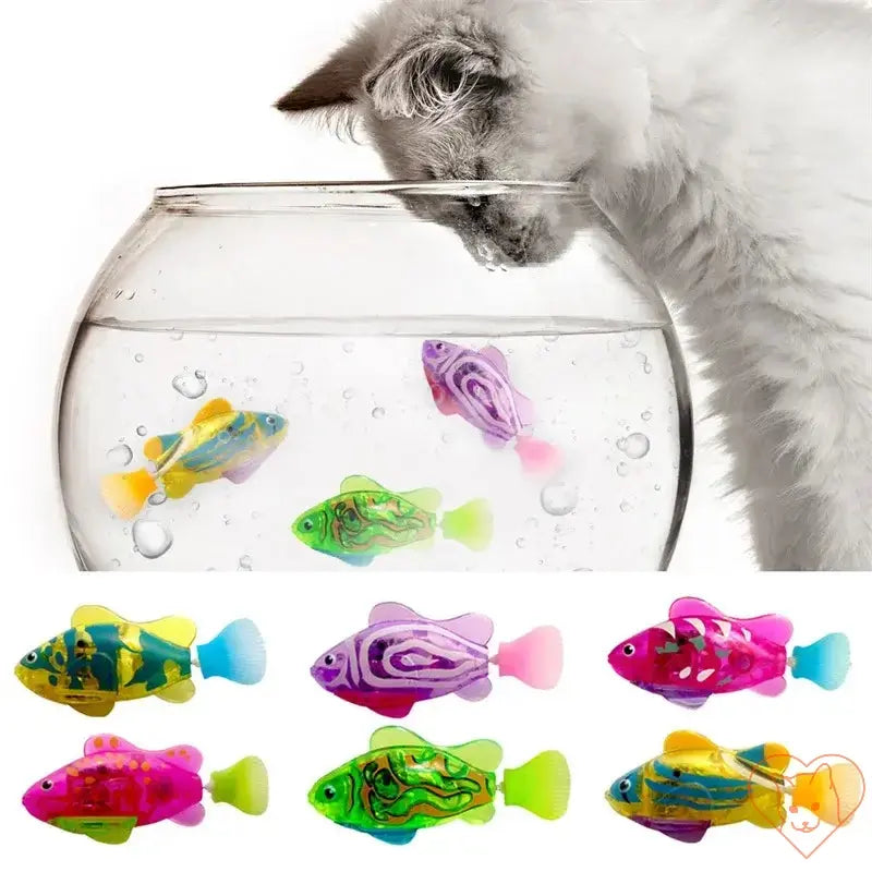 Interactive LED Robo Fish toy for cats swimming in a bowl, with a curious cat peering over the edge.