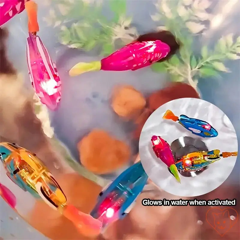 Colorful interactive LED Robo Fish cat toy swimming in water, glowing vibrantly to attract pets.