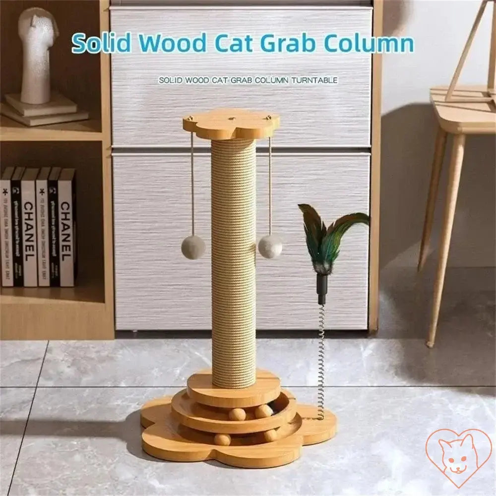 Wooden cat turntable with sisal scratching post and teaser wand for interactive play.