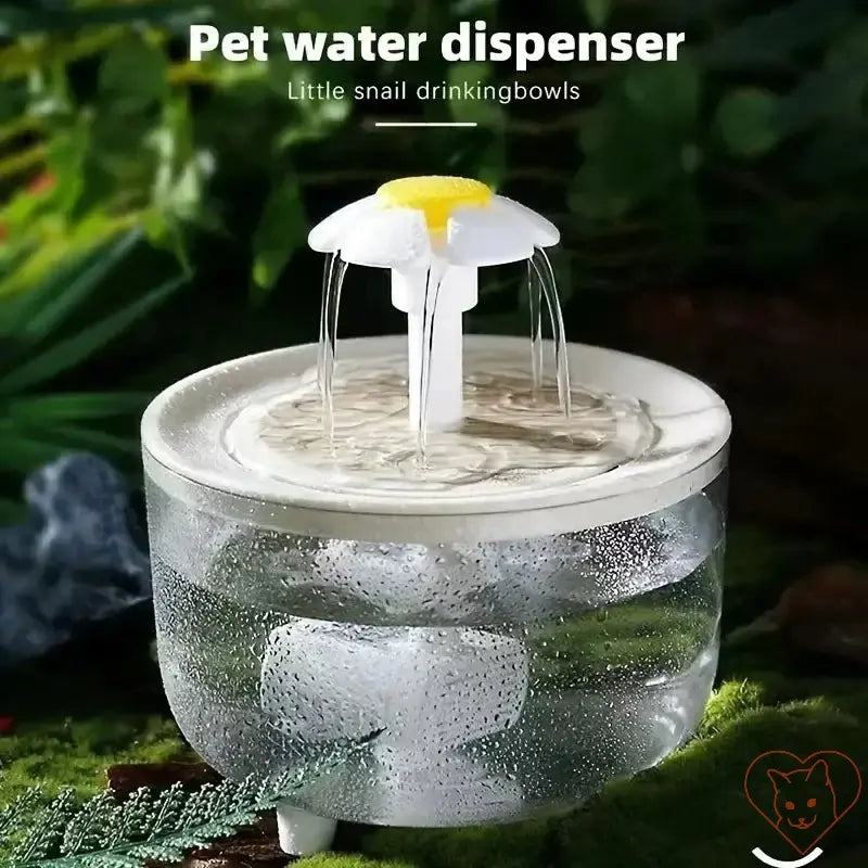 1.2L automatic cat water fountain with adjustable flow, featuring a fun snail design in a lush setting.