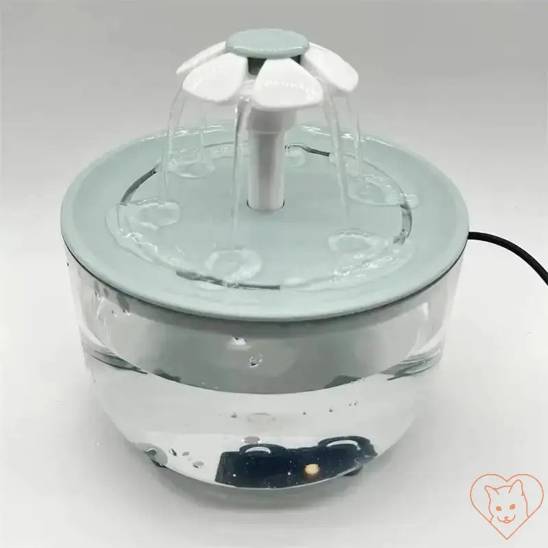 1.2L Automatic Cat Water Fountain with flower-shaped nozzle and adjustable flow for hydration.