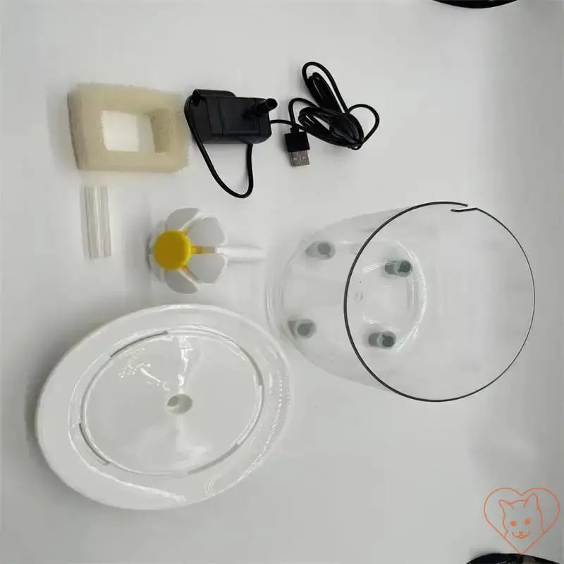 Components of 1.2L Automatic Cat Water Fountain including filter, pump, and water bowl.