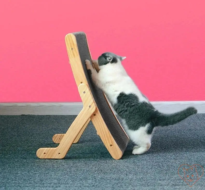 Cat using a 3-in-1 wooden scratcher bed with corrugated cardboard for scratching and lounging.