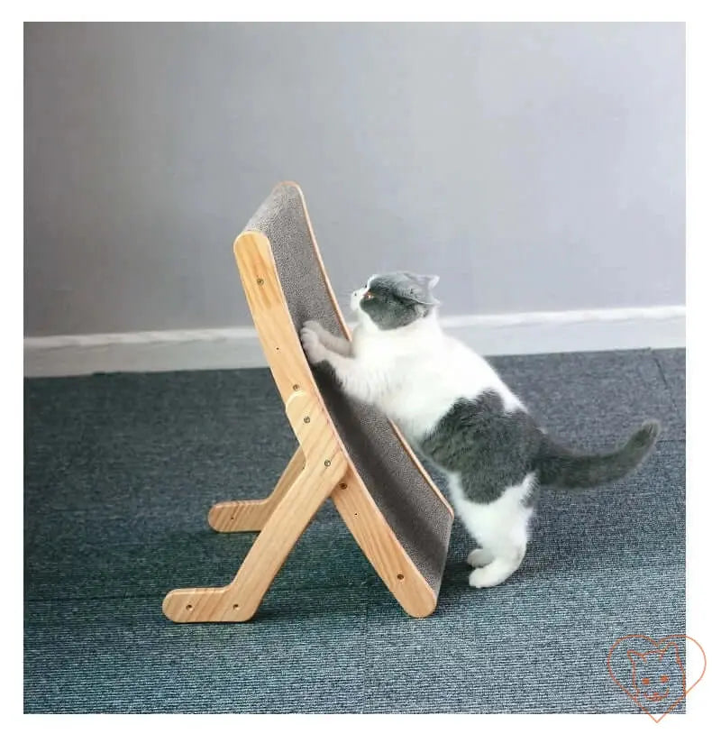 Gray and white cat using a 3-in-1 Cat Scratcher Bed with wooden frame, designed for scratching and lounging.