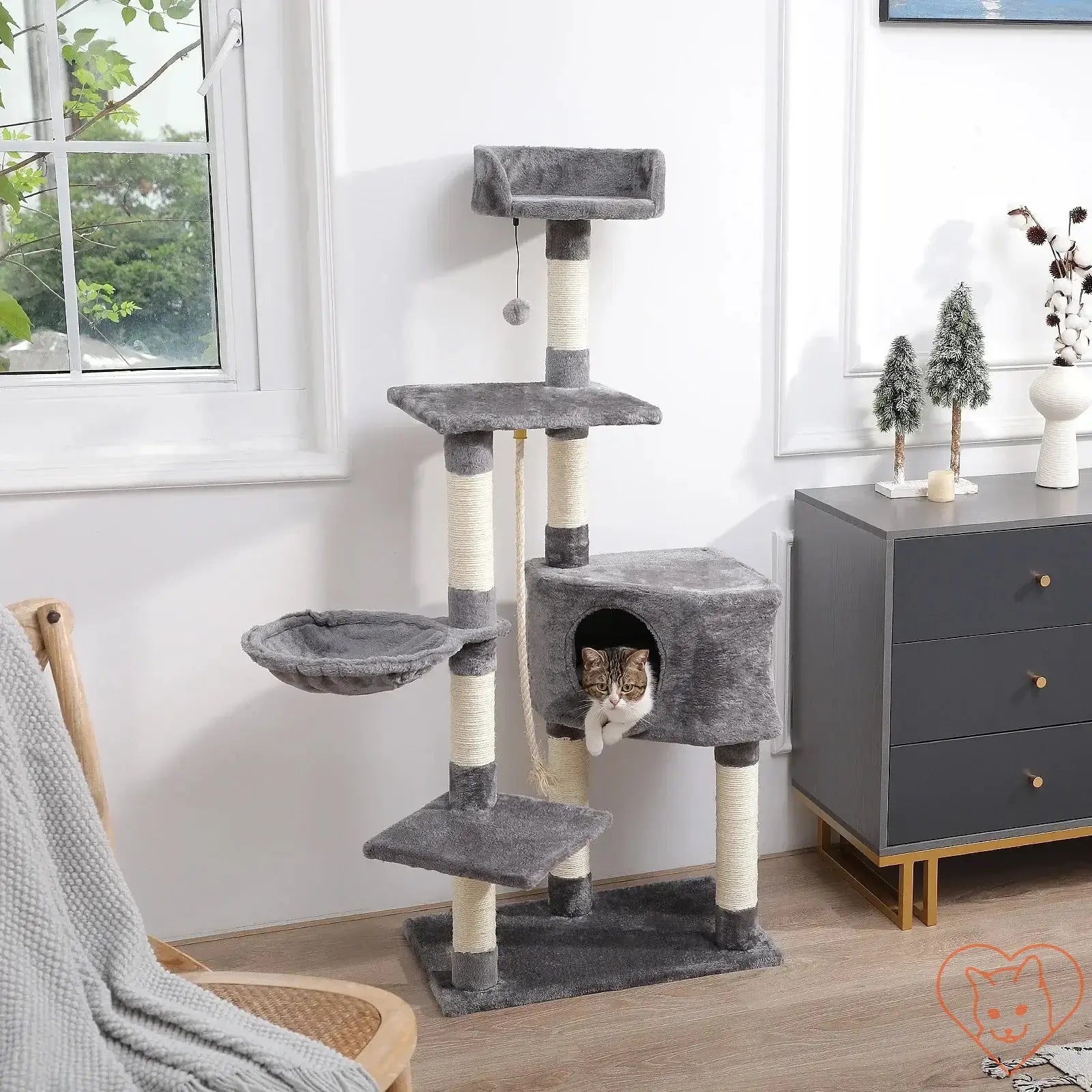 68-inch multi-level cat tree tower with condos, sisal posts, and perch featuring a cat lounging inside.