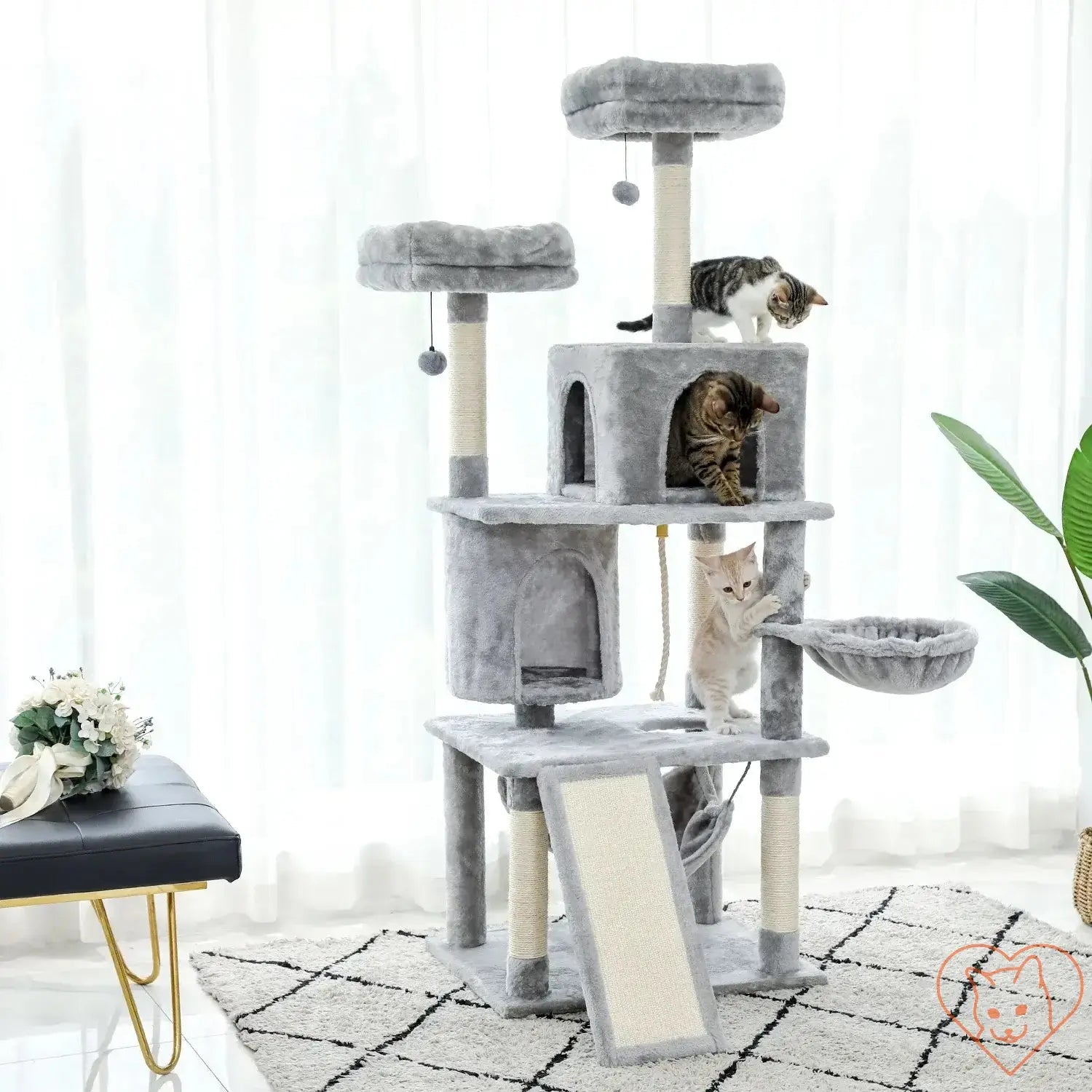 68-Inch multi-level cat tree tower with condos, sisal posts and cats playing on it in a bright room.