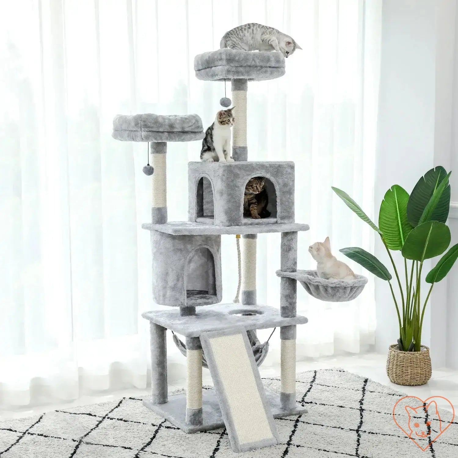 Multi-level cat tree with condos, sisal posts, and multiple perches, featuring playful cats enjoying the structure.