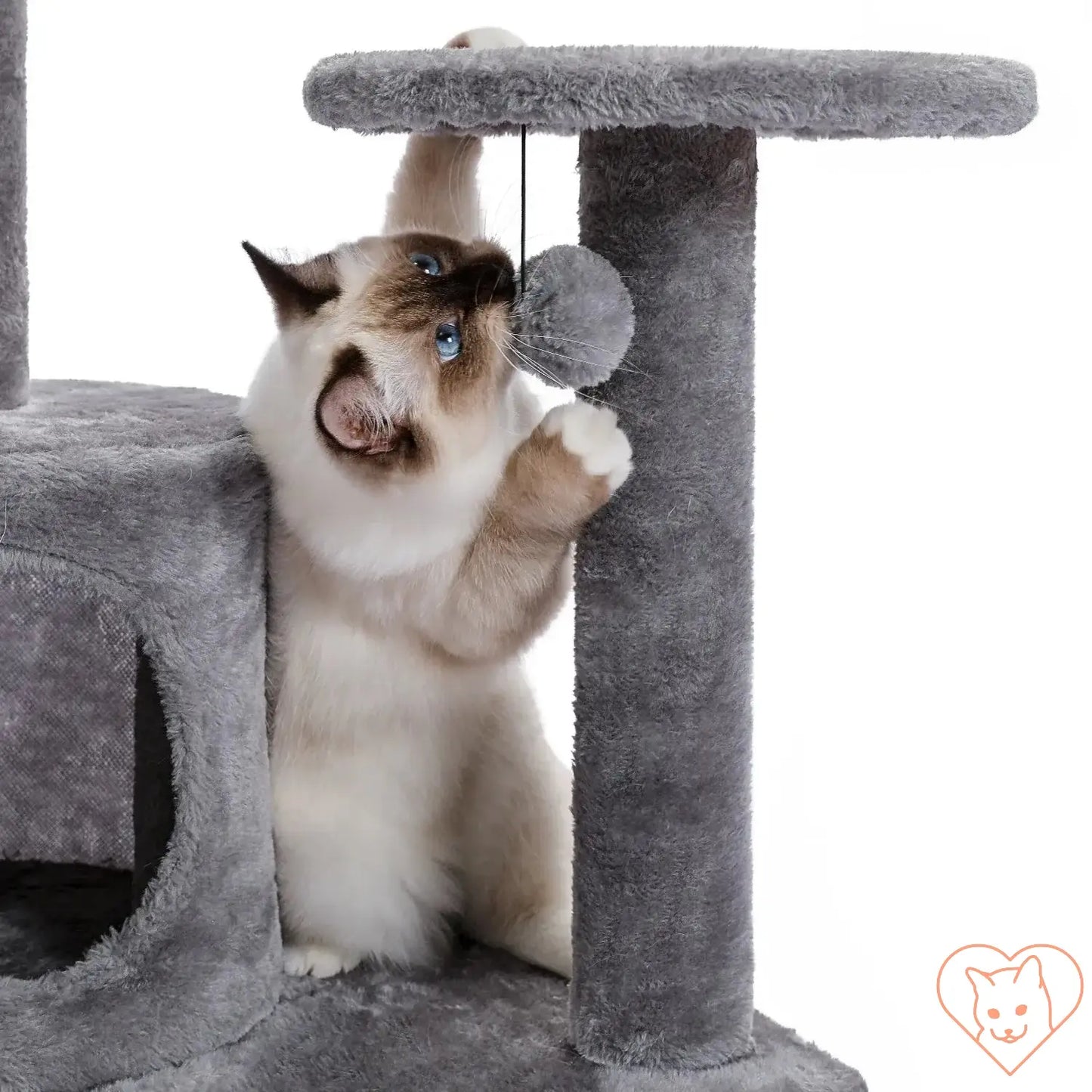 Cat playing with a toy on a multi-level cat tree tower, showcasing its multiple condos and sturdy sisal posts.