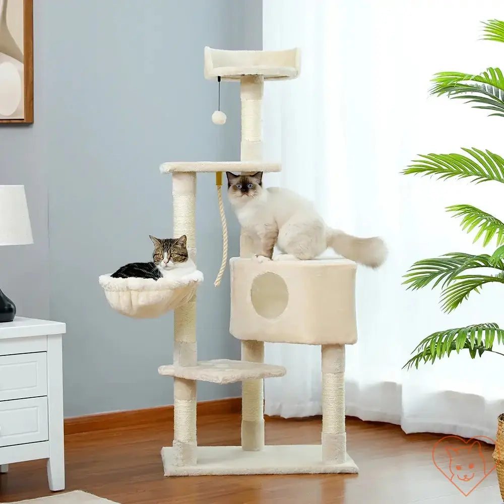 Two cats enjoying a 68-inch multi-level cat tree tower with condos and perch in a cozy living room setting.