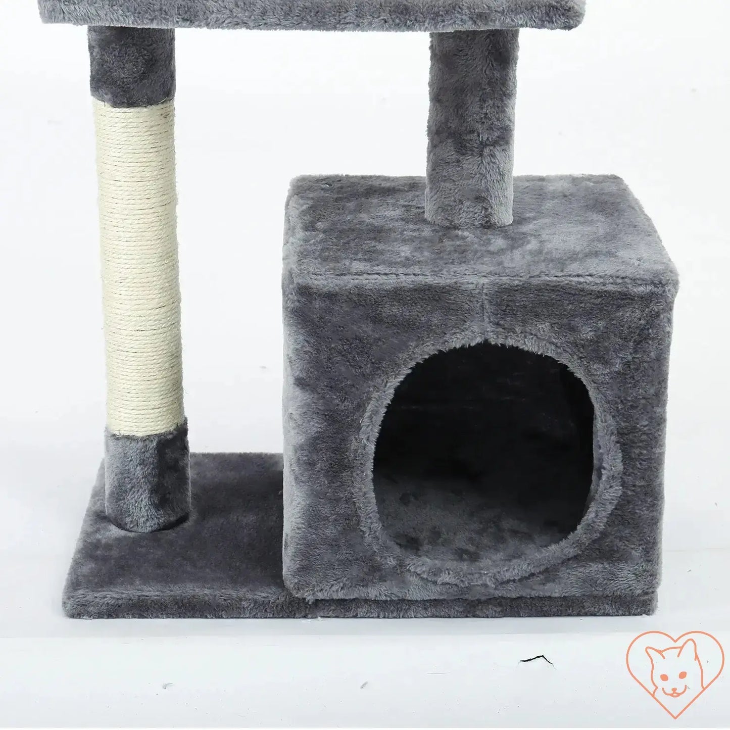 Close-up of a plush gray cat tree with a scratching post and cozy condo for cats.