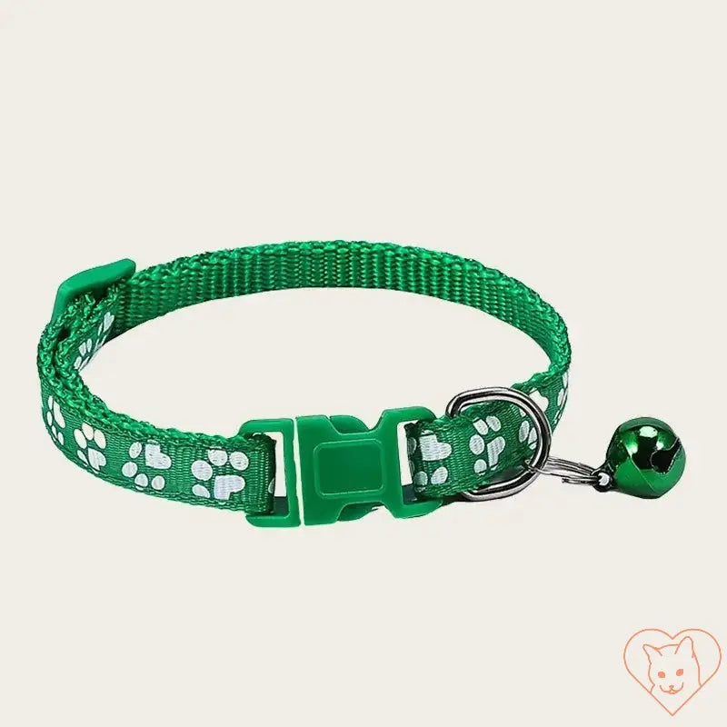 Adjustable green nylon pet collar with white paw print design and bell, perfect for kittens and small animals.