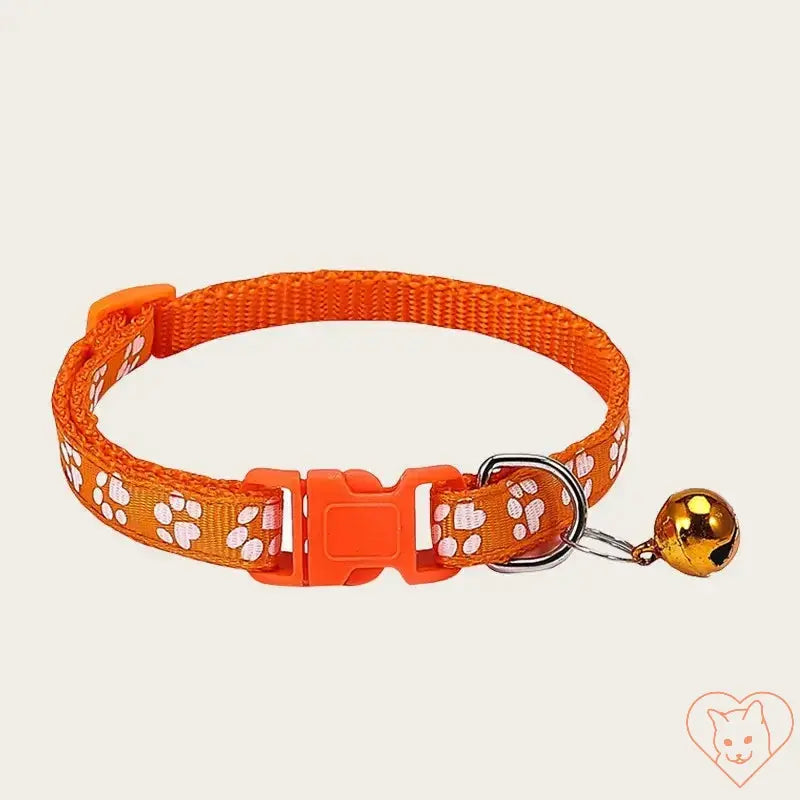 Adjustable nylon pet collar in orange with paw print design and bell, suitable for kittens and small pets.