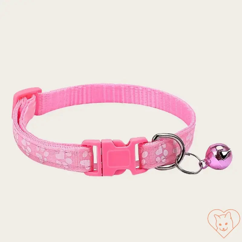 Adjustable pink nylon pet collar with paw print design and bell for kittens and puppies.