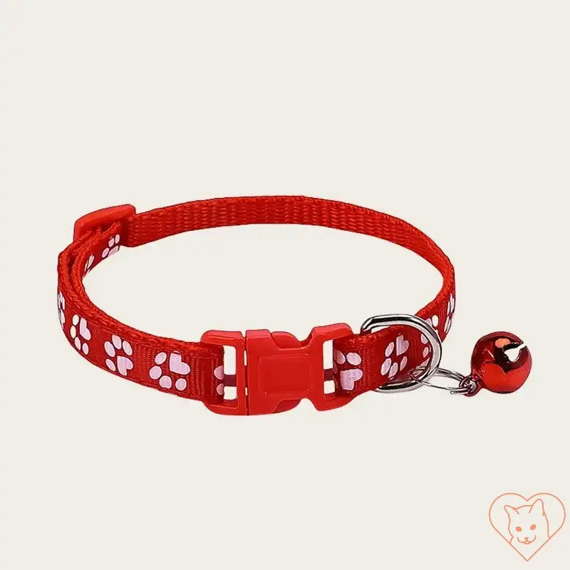 Adjustable red nylon pet collar with paw print design and bell for small animals and pets.