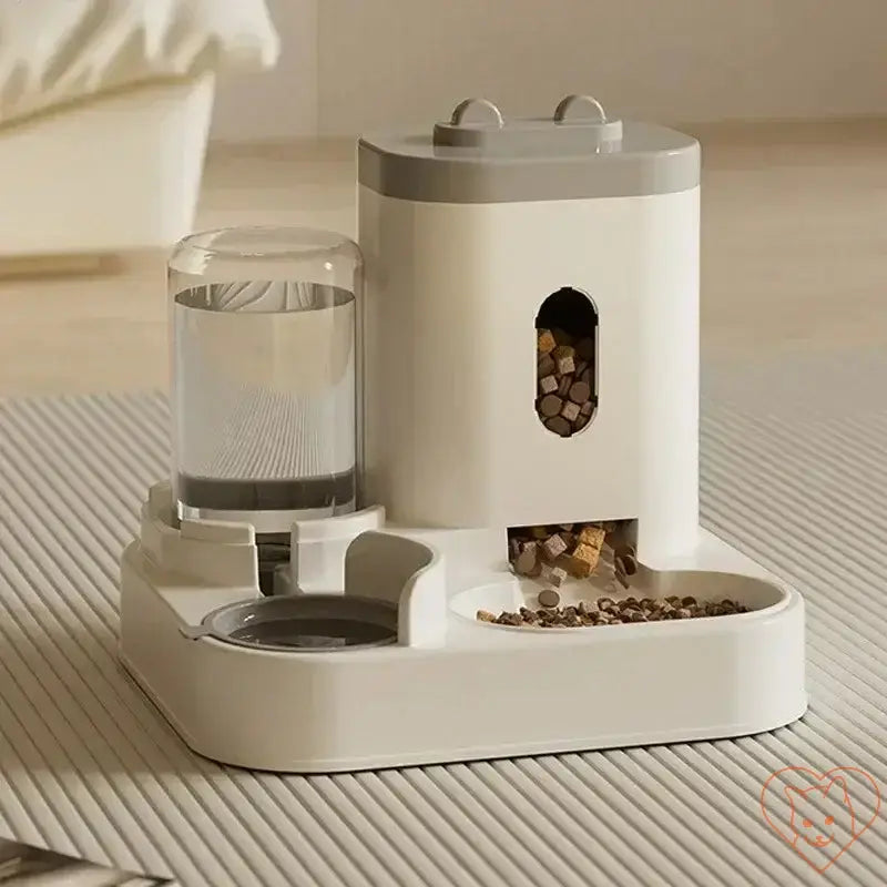 Automatic feeder and water fountain for pets with raised stand and large capacity bowl in modern design.