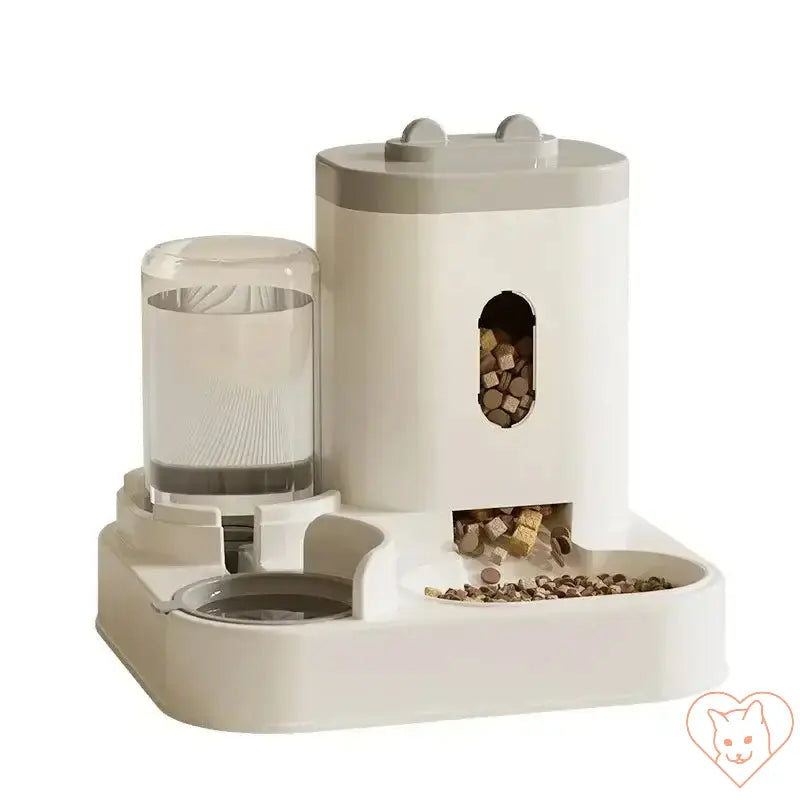 Automatic feeder and water fountain for pets with raised stand and large-capacity bowl, designed for easy feeding and hydration.