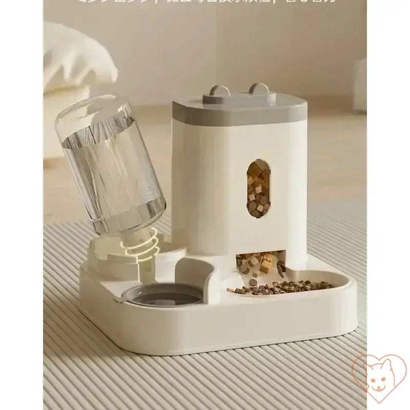 Automatic feeder and water fountain with raised stand and bowl for cats, designed for easy pet mealtimes and hydration.