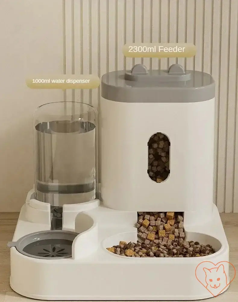 Automatic feeder and water fountain with 2300ml food bowl and 1000ml water dispenser for cats and dogs.