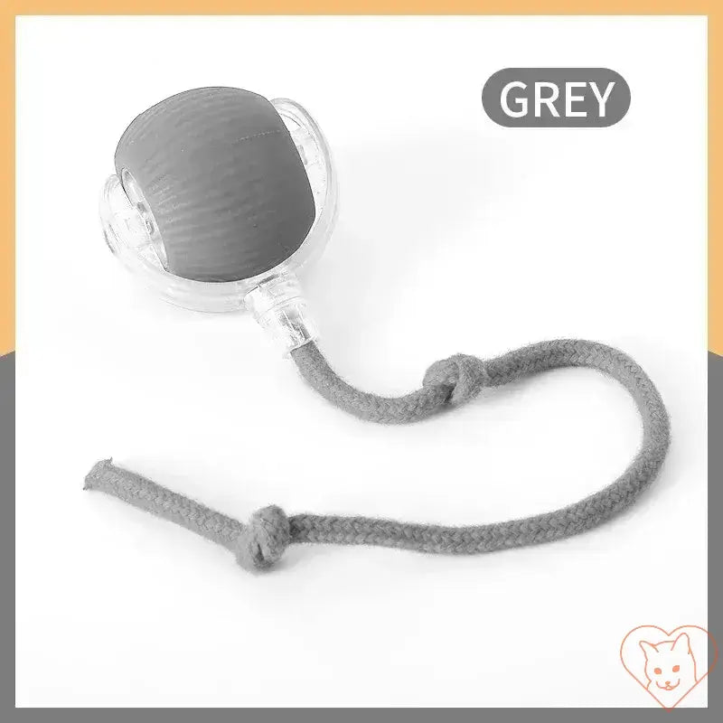 Grey automatic rolling ball interactive cat toy with rope, designed for feline entertainment and exercise.