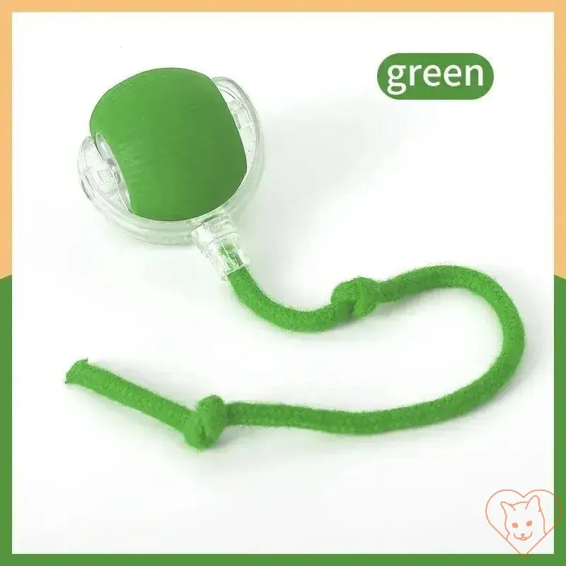 Green automatic rolling ball interactive cat toy with a soft cord for endless feline fun and engagement.