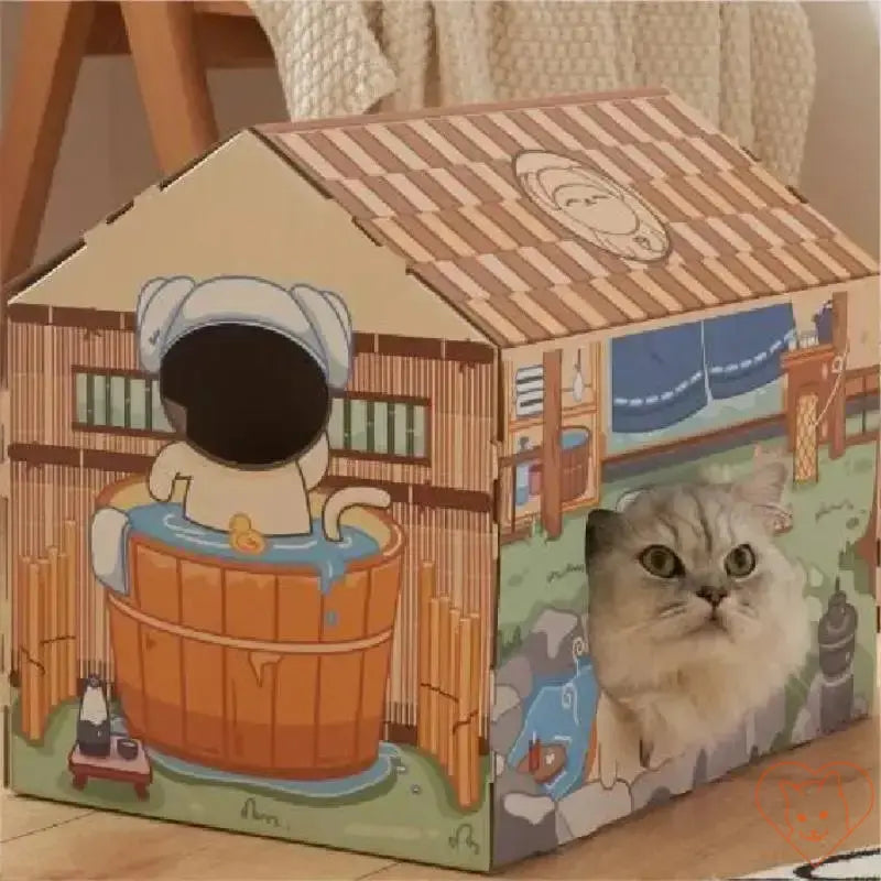 Cozy cardboard cat house with scratching pad, featuring cartoon design and a curious cat peeking out.