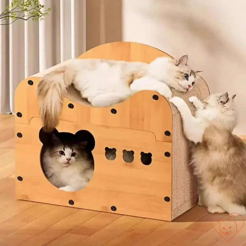 Cats enjoying a Cat Condo with Scratcher Board & Cave, providing relaxation and play for your feline friends.