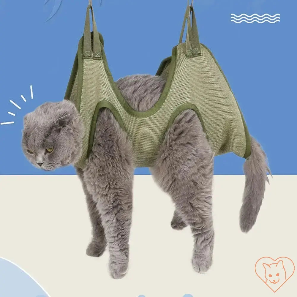 Cat grooming hammock securely holding a gray cat, providing anti-scratch restraint for easy nail trimming.