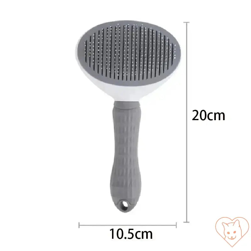 Cat hair brush with stainless steel bristles, ergonomic handle, ideal for grooming short and long-haired cats.