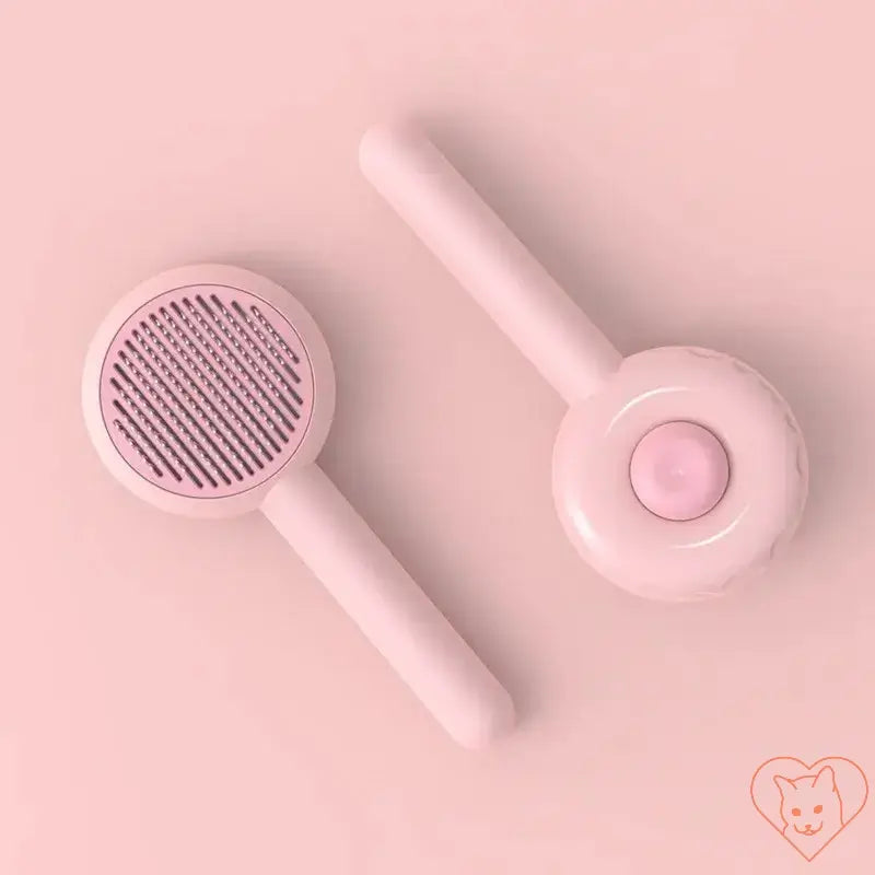 Cat Hair Removal Brush in soft pink, designed for tangle-free grooming and comfortable fur removal.