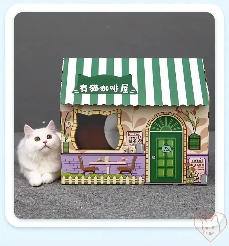 Cozy cat house designed like a cafe, featuring a playful feline and colorful exterior, perfect for relaxation and play.