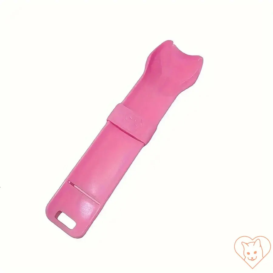 Pink plastic cat strip squeeze spoon for lickable wet cat treats and snacks, efficient feeding tool for pets.