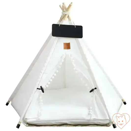 Cozy white Cat Teepee Tent made from durable fabric, featuring plush cushion and sturdy wooden poles.