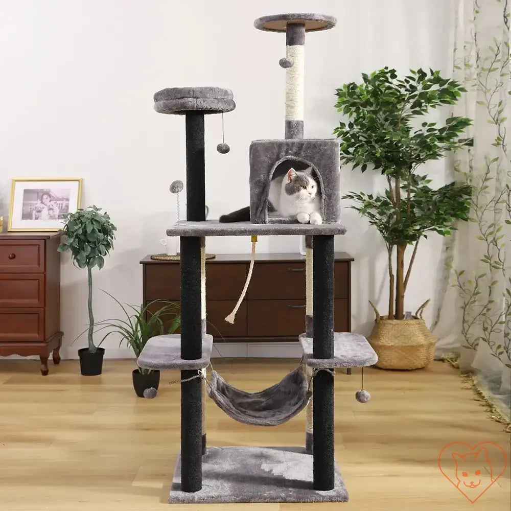 Multi-level Cat Tree House Tower featuring scratching posts, hammock, and cozy condo for playful cats.