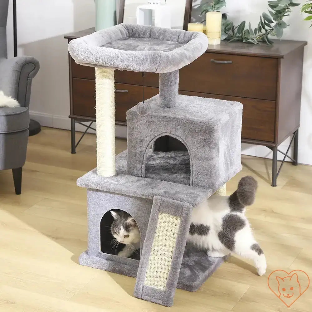 Cat Tree House Tower with grey surface, featuring scratching posts and a playful cat inside.