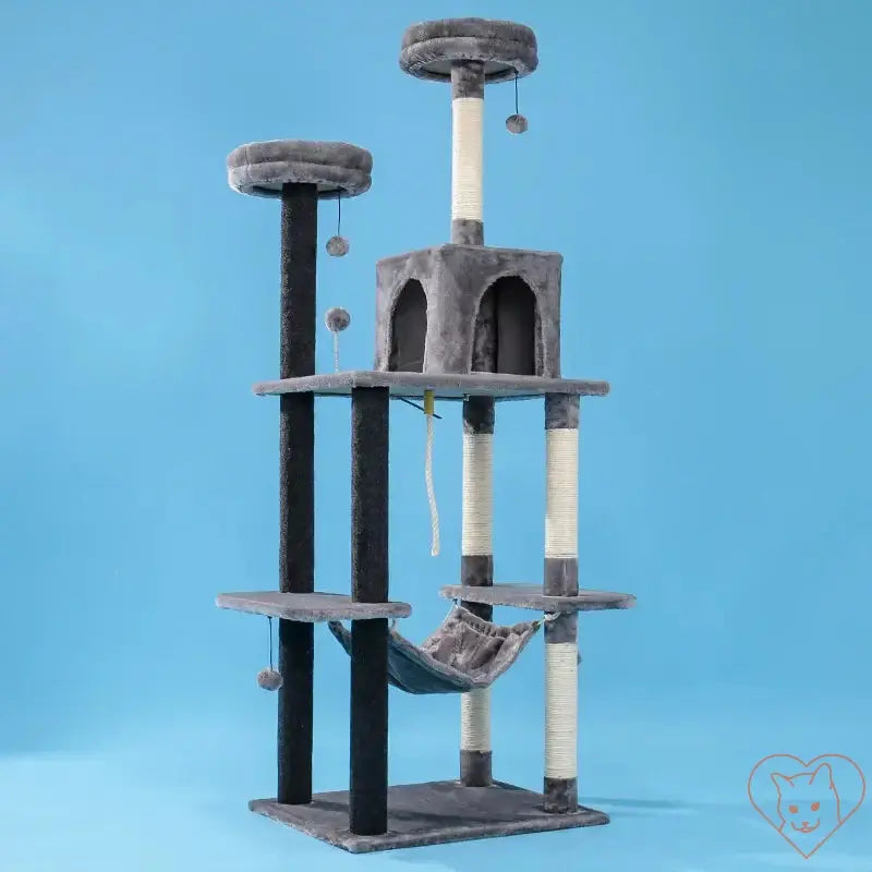 Cat tree house tower with multi-level condo, scratching posts, hammock, and playful hanging toys.