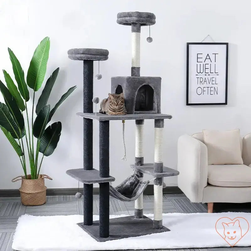 Cat Tree House Tower with multiple levels, scratching posts, and a hammock, ideal for climbing and lounging.