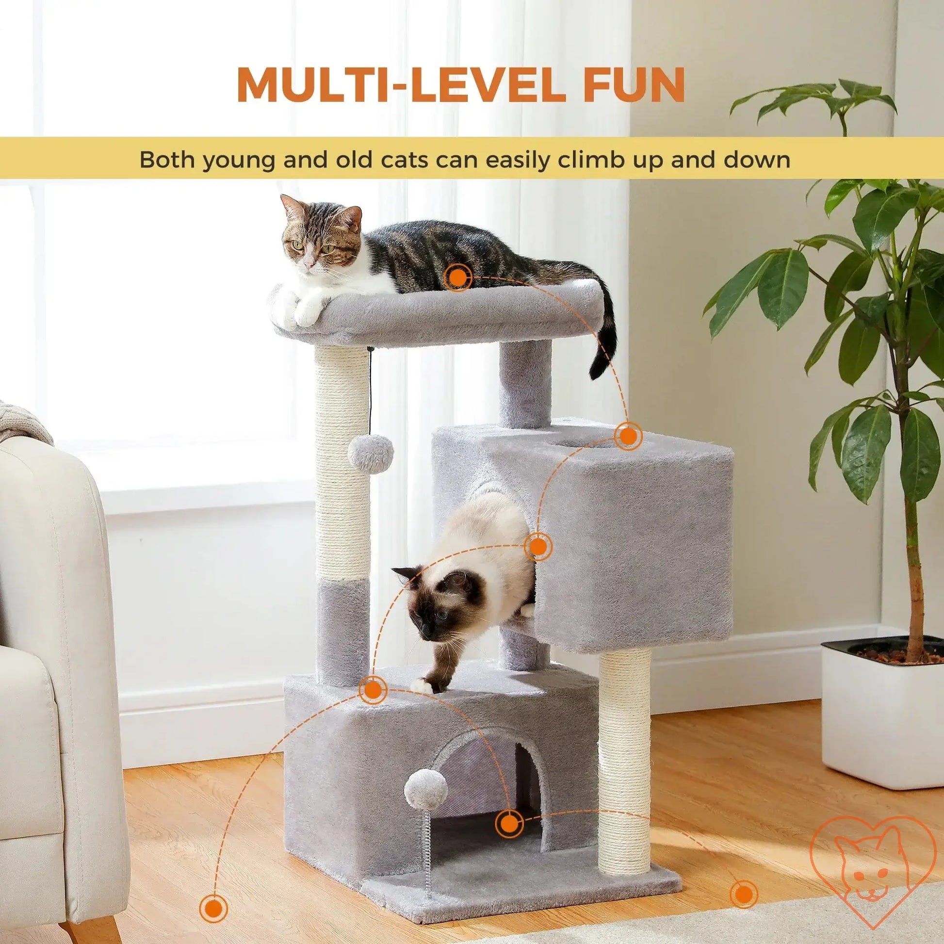 Multi-level cat tree with two cats, featuring scratching posts, big condos, and a perch for climbing and relaxing.