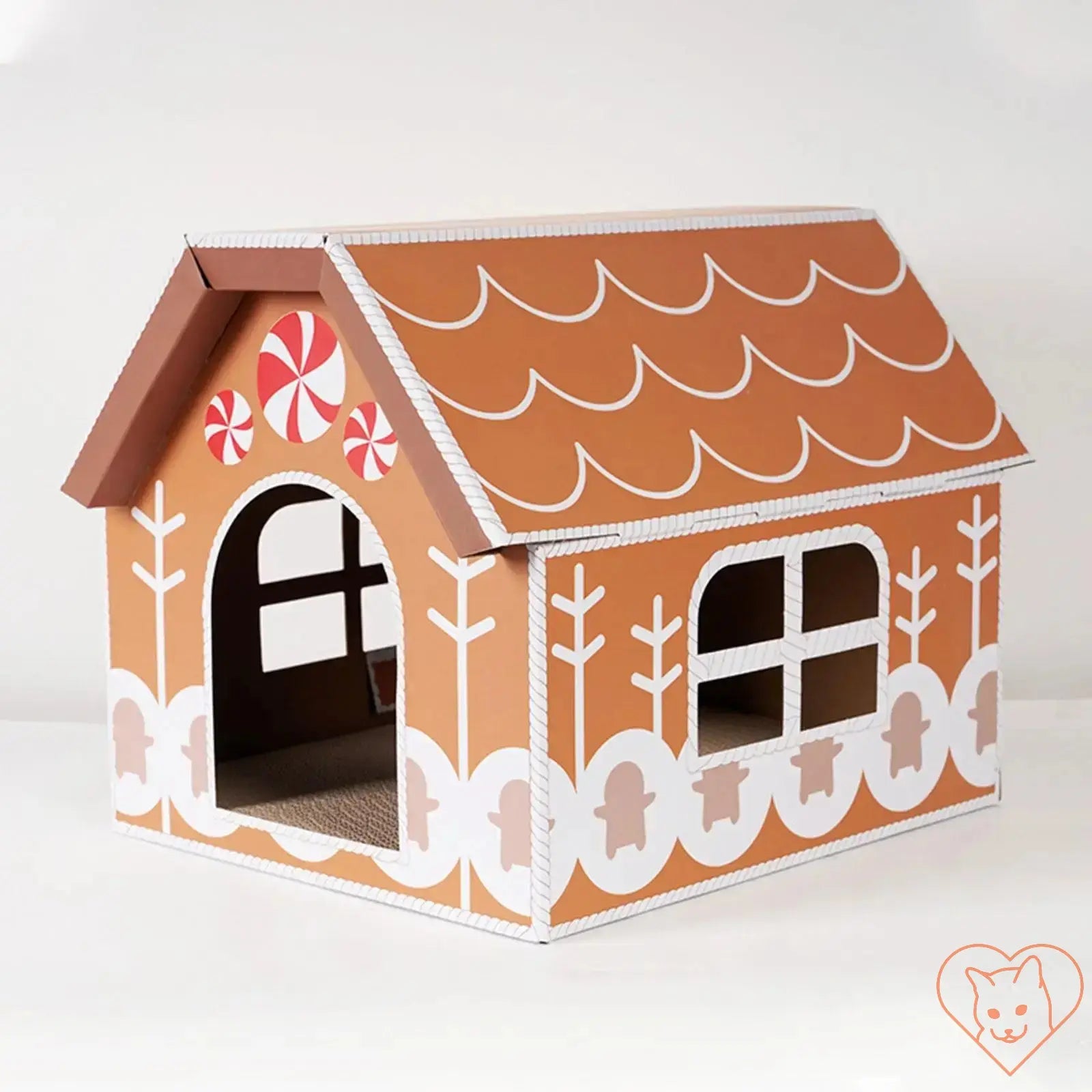 Christmas Cat Scratcher House designed like a gingerbread house with peppermint accents and open windows.