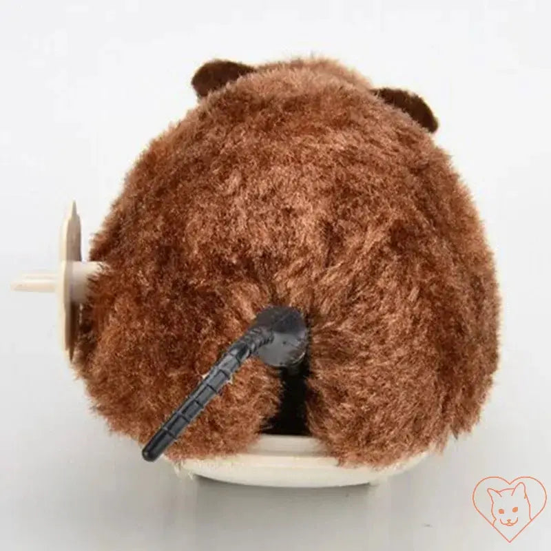 Plush brown clockwork mouse cat toy, showcasing its fluffy rear and black tail, designed for interactive play.