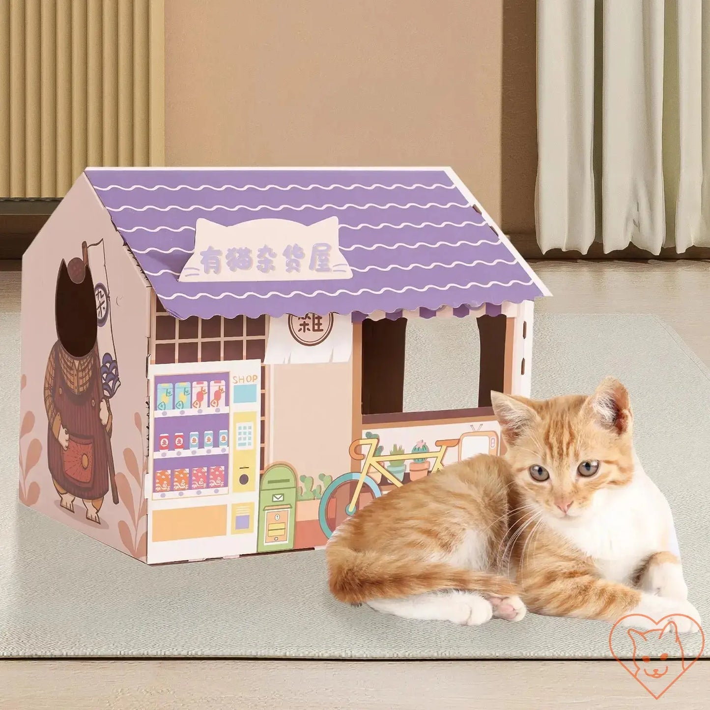 Corrugated cardboard cat house with scratching pad in colorful design and orange cat resting nearby.