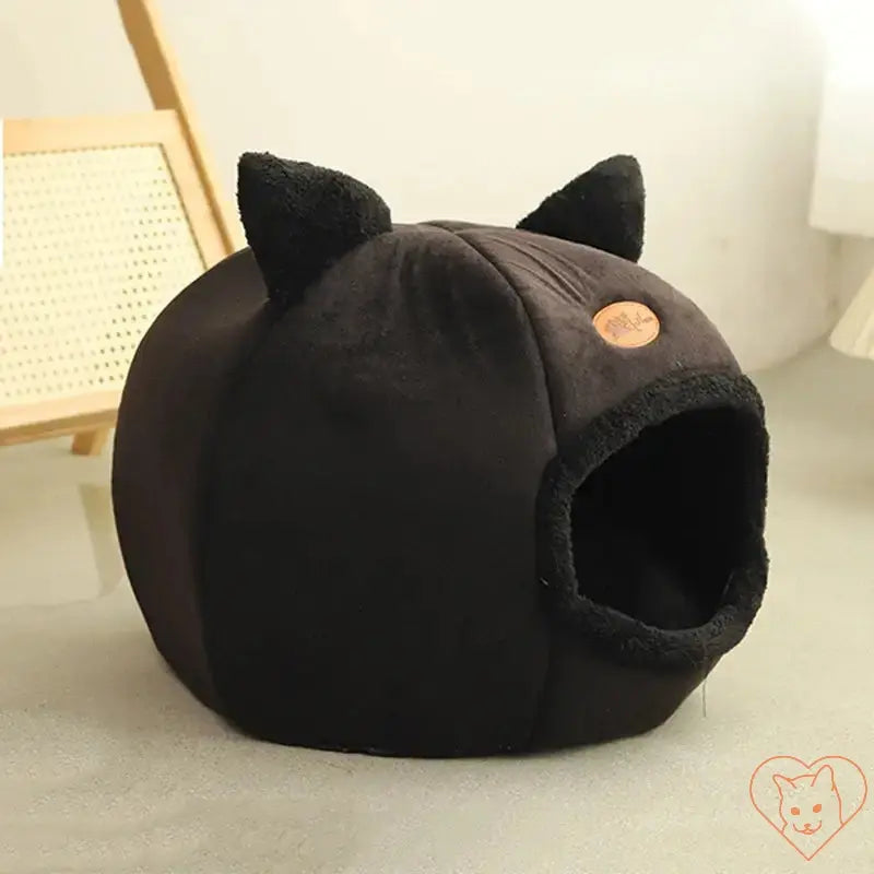 Cozy Winter Cat Cave Bed in black with cat ears, made from soft Velboa fabric for comfy pet naps.