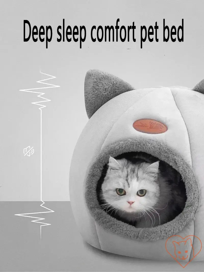 Cozy winter cat cave bed for deep sleep, featuring soft Velboa fabric and plush PP cotton for ultimate comfort.