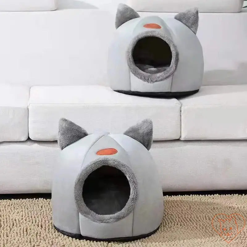 Cozy Winter Cat Cave Bed featuring plush design and cute cat ears, perfect for comfortable pet lounging.