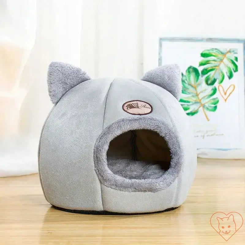 Cozy Winter Cat Cave Bed in gray with ears, soft Velboa fabric, perfect for cats and small dogs.