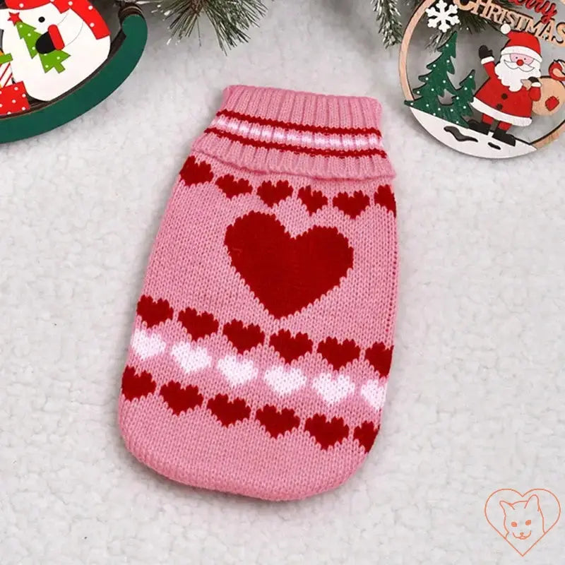 Cute pink cat sweater with heart patterns for winter, ideal for keeping pets warm and stylish.